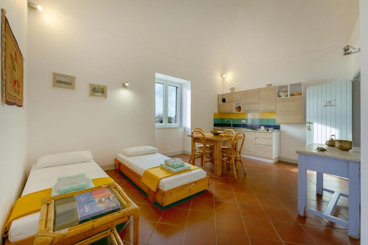 Апартаменты Torretta Corricella- Punta Pizzaco Прочида Экстерьер фото